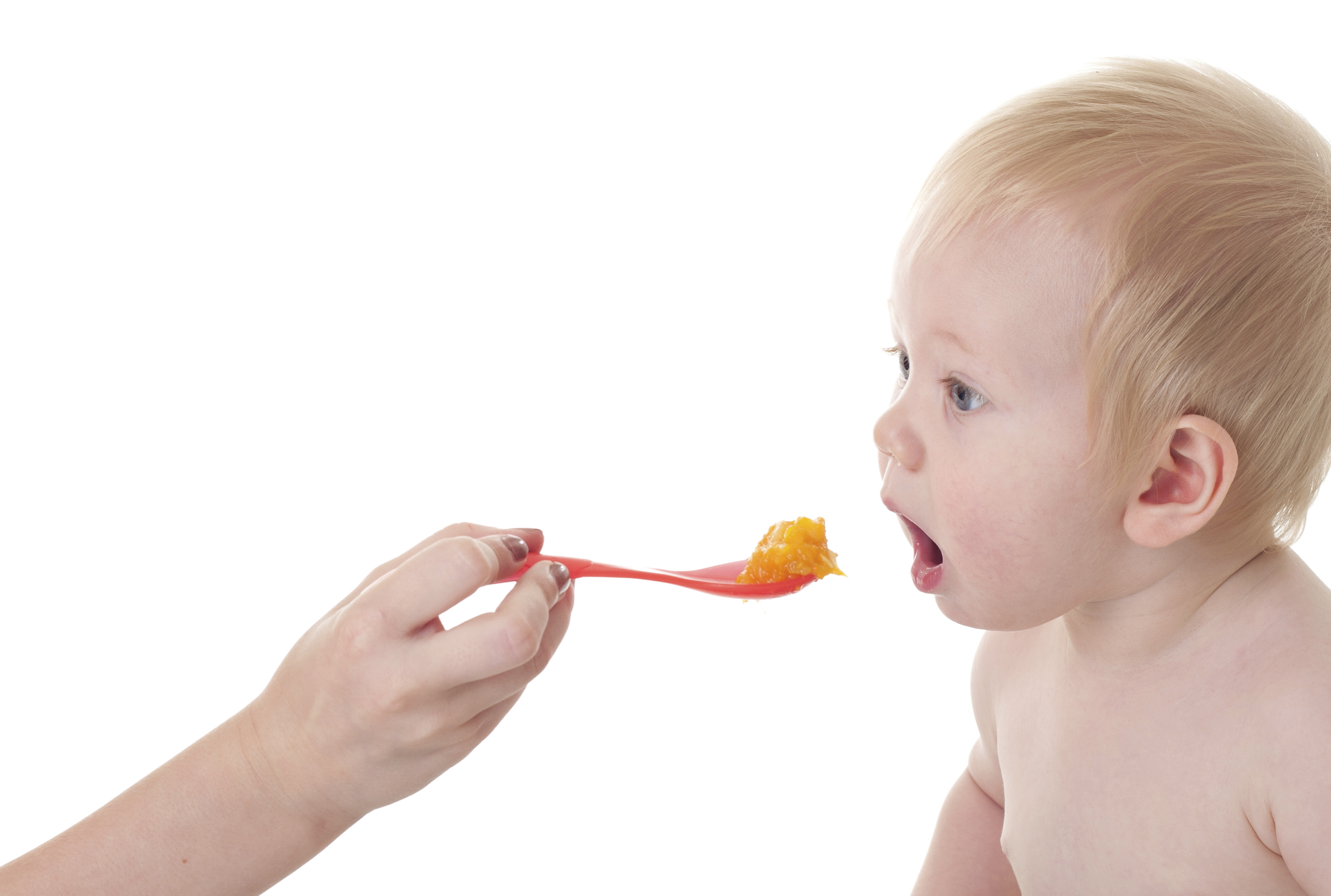 baby eating spoon